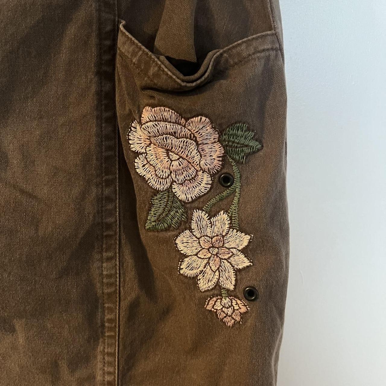 Brown midi skirt with floral embroidery and button details