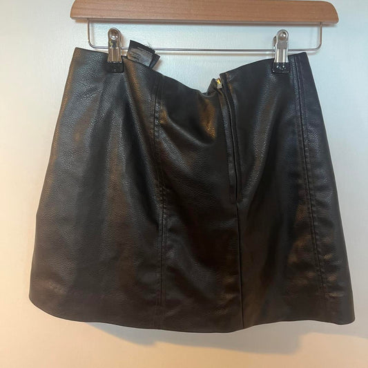Black faux leather mini skirt with zipper and buckle detail